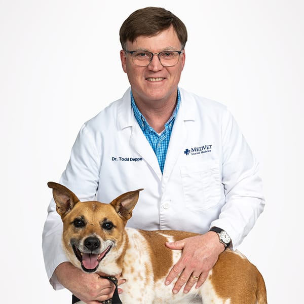 Dr. Deppe with pet dog.