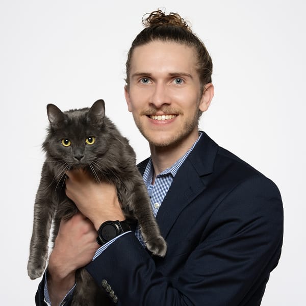 Dr. Riccardi with his pet cat.