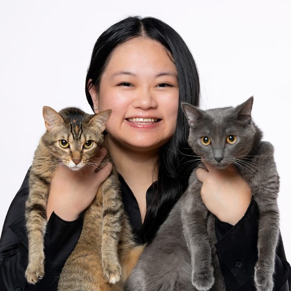 Dr. Porter with pet cats.