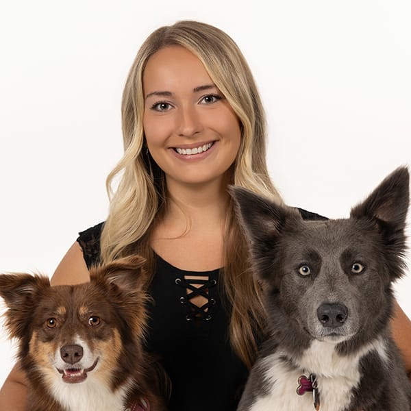 Dr. Gilmore with her pet dogs.
